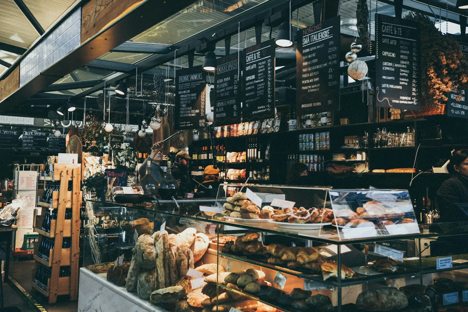 Warm café interior with hanging lights and counters
